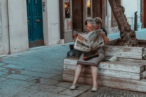 adult-elderly-woman-newspaper-2877151